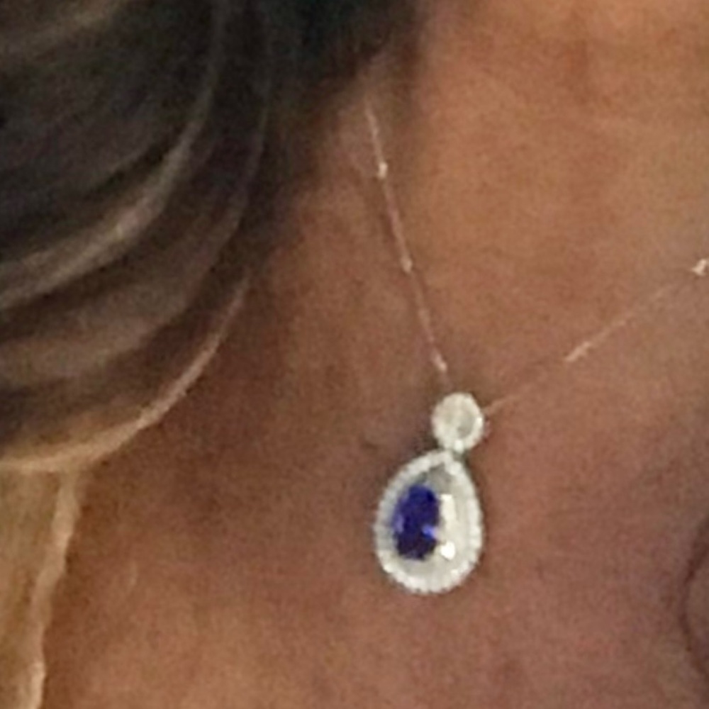 Beautiful 14 karat white gold, Tanzanite, and diamond pendant!